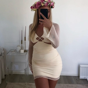 Sexy cream hollow out bodycon dress with mesh sleeves and ruched mini skirt design