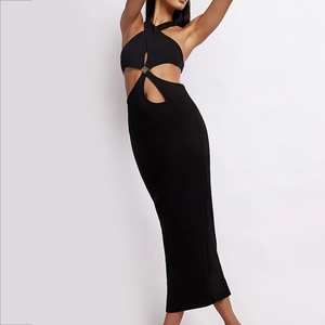 Elegant black halter maxi dress with waist cut-outs and golden metal ring detail