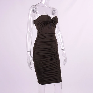 Detail view of coffee brown bodycon dress with ruched fabric and twist knot cutout design