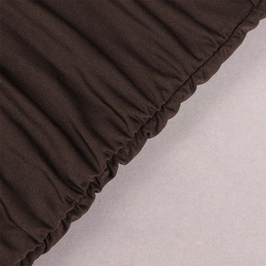 Close-up of deep brown ruched elastic fabric with vertical ribbed knit texture
