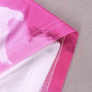 Detail of pink floral dress showing high-quality stitching and white inner lining