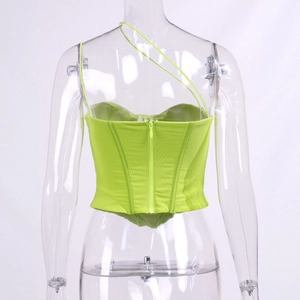 Detail view of neon green corset top featuring slim straps and a hidden back zipper closure