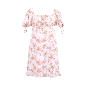 Detail of floral mini dress showing puff sleeves with bow ties and square neckline