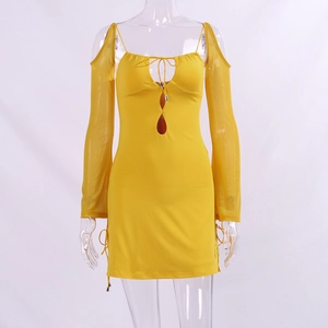 Detail of yellow mini dress featuring cold-shoulder mesh sleeves and drawstring sides