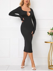 Detail of elegant black bodycon dress with teardrop cutout and thumbhole cuffs