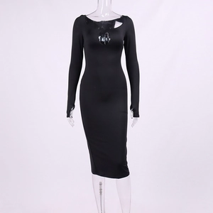 Detail of black bodycon dress featuring hollow-out neckline and thumb hole sleeve design