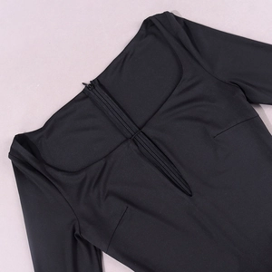 Detail of square neckline and back invisible zipper on black bodycon dress