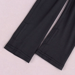Close-up of functional thumbhole design on black high-elasticity sleeve cuff fabric