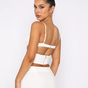 Slim fit white corset top with thin straps and back zipper detail for women