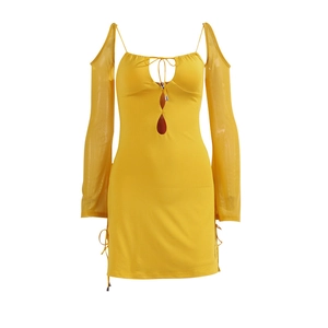Slim fit bright yellow long sleeve mini dress with cut-outs and lace-up metal details