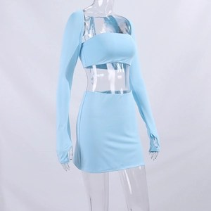 Light blue three-piece knit set featuring crop top, mini skirt and shrug with thumbholes
