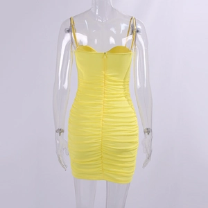 Detail of yellow ruched bodycon dress with spaghetti straps and back hidden zipper