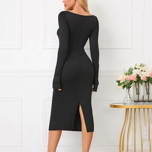 Slim fit black long sleeve dress with square neck and back slit on white background
