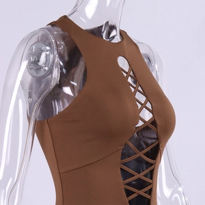 Detailed view of brown sleeveless bodysuit featuring cross lace-up cutout and halter neck
