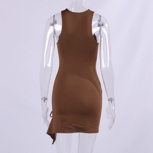 Detail of brown bodycon dress featuring racerback cut and asymmetrical hemline design