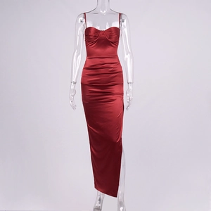 Close-up of dark red satin dress showing ruched bust detail and sleek silk texture