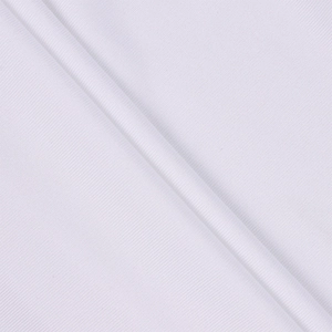Close-up of white ribbed knit polyester fabric texture on a sexy halter neck dress