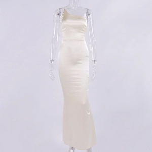 Detailed view of champagne satin dress featuring elegant one-shoulder neckline and mermaid cut