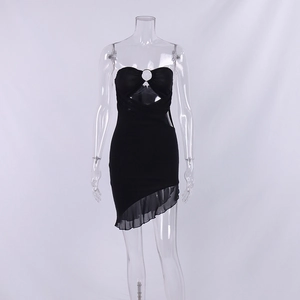 Detail of black bodycon mini dress with metal ring cutout and mesh ruffle hem