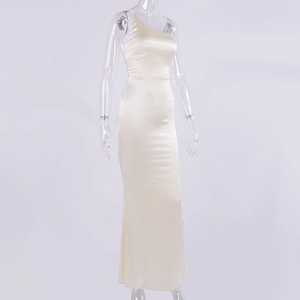 Detail of elegant one shoulder champagne satin dress with a smooth glossy silk finish