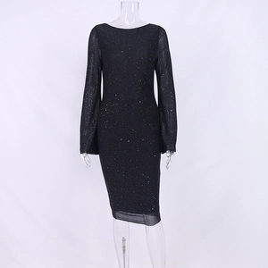 Detailed view of black mesh sequin dress with long sleeves and off-shoulder neckline