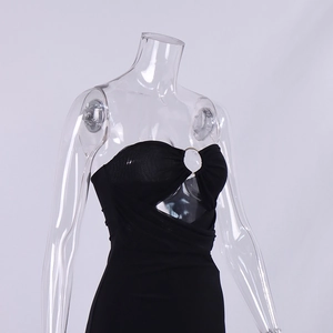 Detail view of the black mesh dress featuring a hollow pleated bust with silver ring