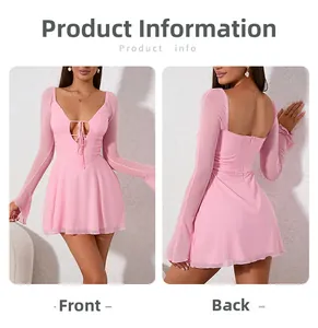Detail view of pink V-neck mesh mini dress with flare sleeves and lace-up front design