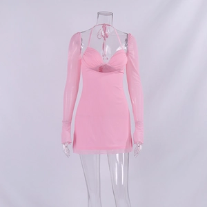 Detail of pink mesh long sleeve shrug paired with a matching cutout halter mini dress