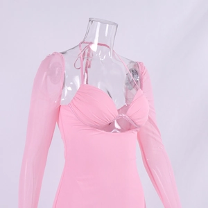 Detail of light pink mesh long sleeves and halter neck ties on a slim-fit dress