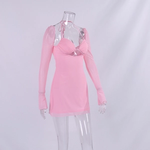 Detail of pink halter bodycon dress with matching sheer mesh long sleeve cardigan
