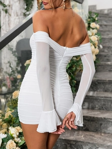 Detailed back view of white off-shoulder mesh dress with ruched texture and flared sleeves