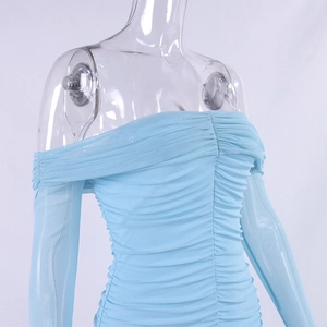 Detail view of light blue mesh fabric showing ruched texture and fitted stitching