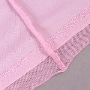 Close-up of pink mesh dress fabric detail showing high-quality overlock stitching and texture