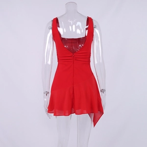 Detail view of the red backless chiffon dress featuring asymmetric hem and hidden zipper