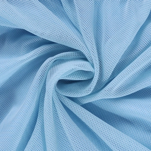 Detail view of light blue mesh fabric showing breathable texture and soft drape