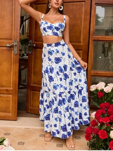 Detail of blue floral crop top and tiered maxi skirt set with elegant rose print