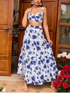 Detail of blue floral print on backless crop top and tiered maxi skirt set