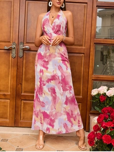 Detail of pink and purple floral mesh maxi dress with halter V-neck and flowing skirt