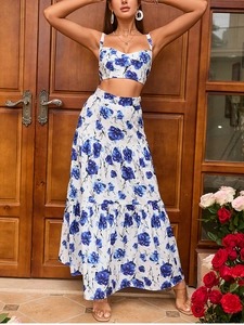 Floral print two-piece summer set featuring a cropped camisole and layered maxi skirt
