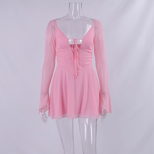 Detail view of pink long sleeve dress with deep V-neck, drawstring and mesh sleeves