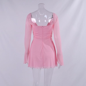 Pink mesh long sleeve mini dress detail showing the open back design and invisible zipper