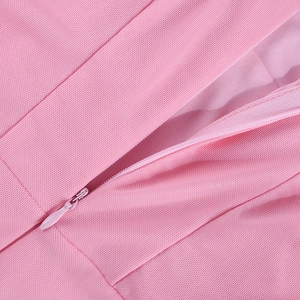 Detail view of pink mesh dress featuring a matching high-quality invisible zipper closure