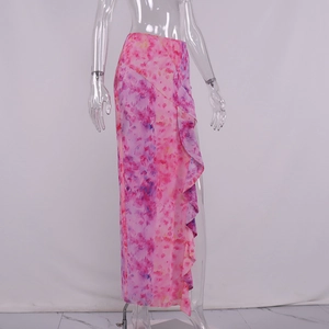 Detail of pink abstract floral maxi skirt featuring side ruffles and high waist cut