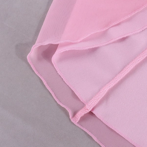 Detailed macro view of pink mesh fabric texture and high-quality overlock stitching