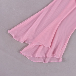 Detail of pink mesh fabric with ruffled edges and neat hem stitching for a dress