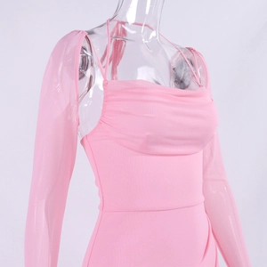 Detail of pink mesh long sleeve dress showing fine pleats on the neckline and fabric texture