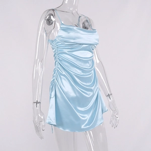 Detail of light blue satin mini dress showing side drawstring ruching and silky texture