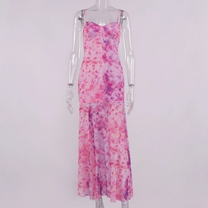 Detailed view of the thin spaghetti straps and molded cups on the mesh floral dress