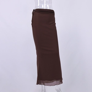 Detail of dark brown double-layered mesh maxi skirt with side ties and ruching