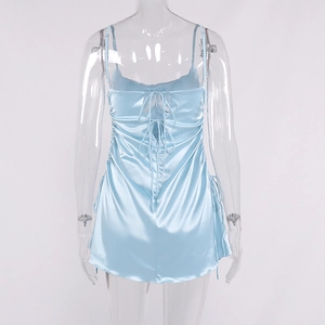 Detail of light blue satin mini dress showing open back with elegant double bow ties
